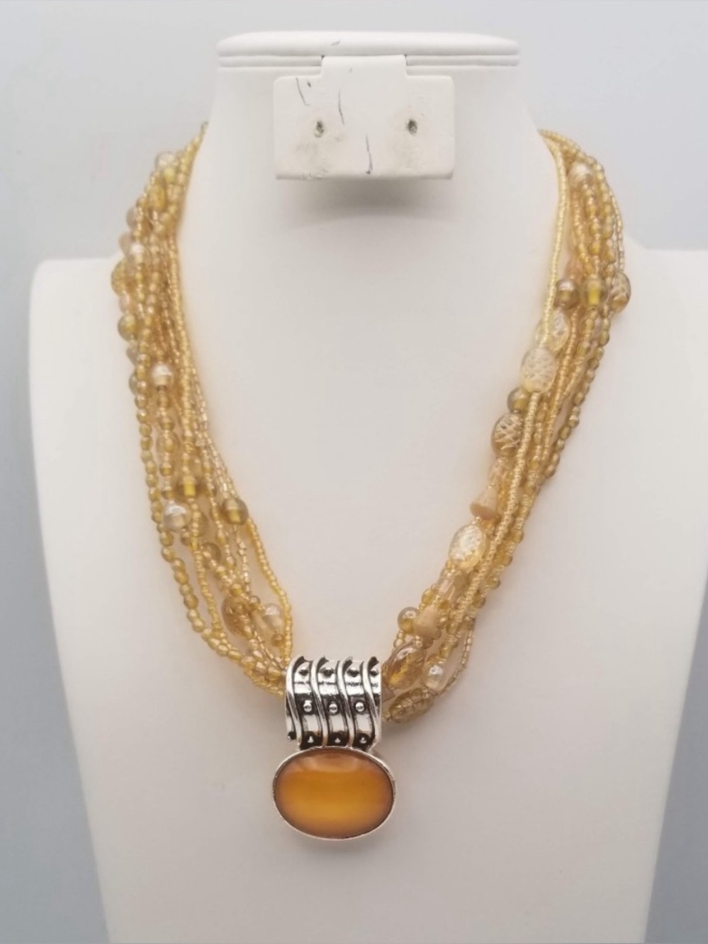 Gold Beaded Multi-Strand Necklace with Amber Pendant